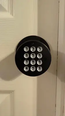 a light on a door with a bunch of buttons at K11 Private Room with Smart TV Near Everything in Orlando