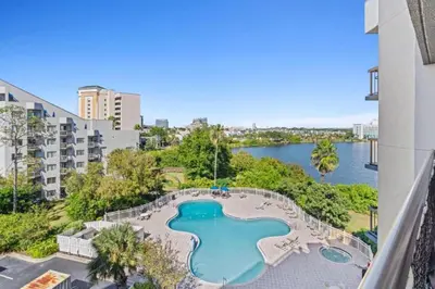a view of a swimming pool from a building at 2701 Enclave Condo near Univesal-Lakeview in Orlando