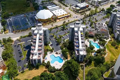 an aerial view of a building with a pool at 3704 Relax Unwind 2-BD 2-BA Resort Condo in Orlando