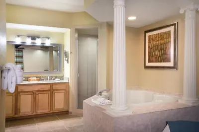 a large bathroom with a tub and a shower at Wyndham Star Island Resort 2BR Apartment with Resort Access in Kissimmee