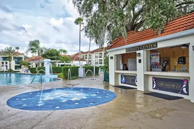 a fountain in the courtyard of a resort at Wyndham Star Island Resort 3BR Apartment with Resort Access in Kissimmee