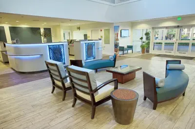 a lobby of a hospital with chairs and a couch at Wyndham Cypress Palms 1BR Apartment with Resort Access in Kissimmee