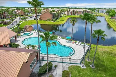 an aerial view of a pool at a resort at Adventure's at Villa Del Sol in Kissimmee