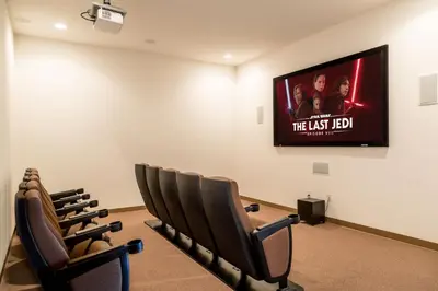 a waiting room with a flat screen tv on the wall at Celebrate at Club Cortile in Kissimmee