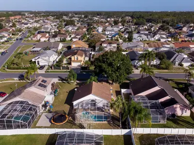 an aerial view of a residential neighborhood with houses at Cozy on Cavendish - Themed bedrooms in Kissimmee