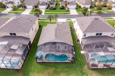 an aerial view of a house with a swimming pool at Emerald Island Happy Place in Kissimmee