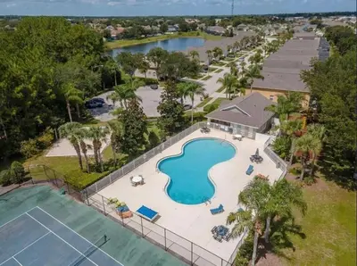 an overhead view of a pool at a resort at New Ownership - 7BR - close to Disney in Orlando