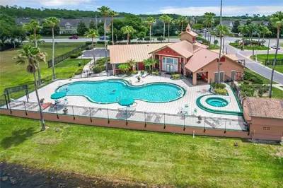 an overhead view of a swimming pool at a resort at Playing Hooky in Kissimmee
