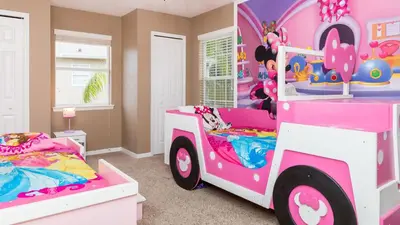 a pink and white truck bedroom with two beds at Serendipity at Acadia - Family getaway in Orlando