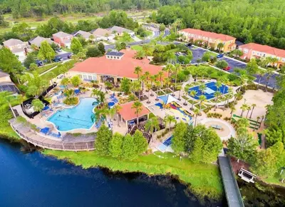 an aerial view of a resort with a swimming pool at Terra Verde - Resort Amenities & More in Kissimmee