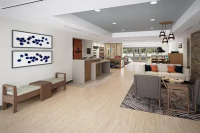 a lobby of a hospital with a waiting room at Candlewood Suites Orlando North - Winter Park by IHG in Orlando