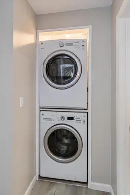 a laundry room with a washer and dryer at Cozy Townhome in Fantasy World Near Parks in Kissimmee