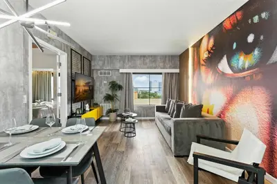 a living room with a couch and a table at 1 BR1 Bath sleeps 6 Close to Universal Parks in Orlando