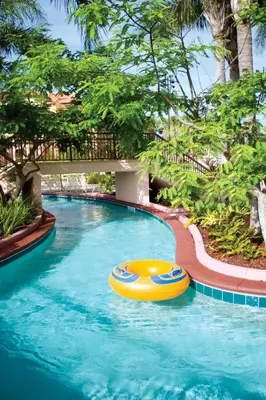 a pool with a yellow raft in the water at Wyndham Bonnet Creek 3BR Apartment with Resort Access in Orlando