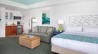 a hotel room with a bed and a couch at Marriott's Harbour Lake Studio Apartment with Resort Access in Orlando