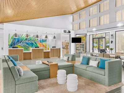 a living room with two couches and a tv at Marriott's Imperial Palms 3BR Apartment with Resort Access in Orlando