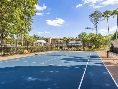 a tennis court with a tennis court at Marriott's Royal Palms 2BR Apartment with Resort Access in Orlando