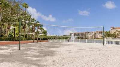 a volleyball net in front of a building at Marriott's Grande Vista Studio Apartment with Resort Access in Orlando