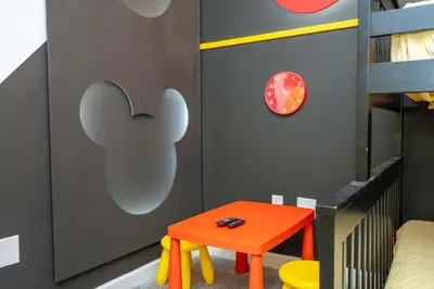 a childs room with a bed and a orange table at Private Pool - Themed Rooms - Near Disney 4239 in Kissimmee