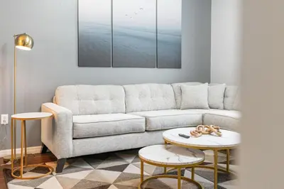 a living room with a couch and two tables at Amazing 3 Bdr House near Disney - LV22106 in Kissimmee