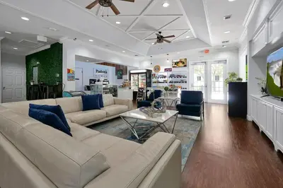 a living room with a couch and a table at Amazing 3 Bdr House near Disney - LV22106 in Kissimmee