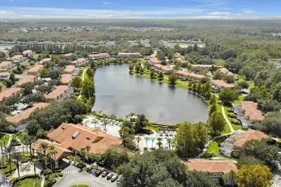 an aerial view of a lake in a residential neighborhood at NEW - Townhome on amazing resort - private hot tub in Kissimmee