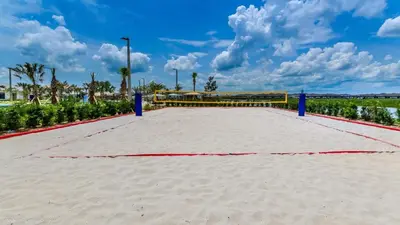 a volleyball court at a resort on the beach at Storey Lake Villa in Kissimmee