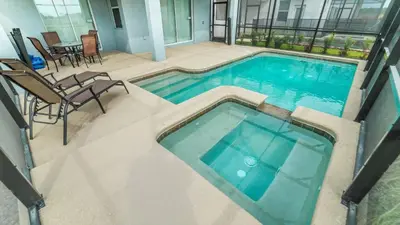 an overhead view of a swimming pool in a building at The Sunshine Villa in Kissimmee