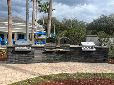 a brick wall with four heaters on top of it at Condo near Disney Springs-Free shuttle to Parks in Orlando