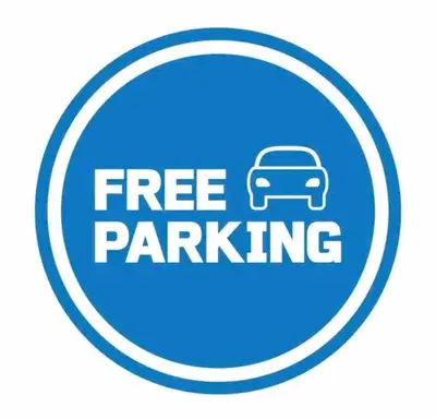 a free parking sign with a car in a circle at Cozy Condo near Disney World with Shuttle to parks in Orlando
