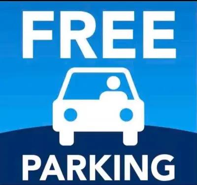 a sign that says free parking with a car on it at Condo near Disney Universal Free Parking in Orlando