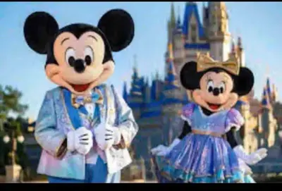 two mickeys dressed in costumes in front of walt disney world at Condo near Disney Universal Free Parking in Orlando