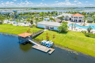 an aerial view of a resort on the water at 4822 Resort Pool House Disney Universal Orlando in Kissimmee