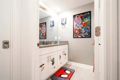 a bathroom with a sink and a sink at Last Minute Disney Private Pool Themed Bedrooms. Book Now SLR516 in Kissimmee