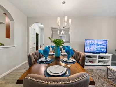 a dining room with a table and chairs at Magnificent 2 Bedroom Apt Vista Cay Resort 107 in Orlando
