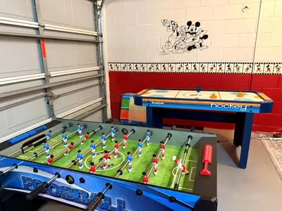 a table with a miniature baseball game on it at The Windsor Hideaway in Orlando