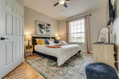 a bedroom with a bed and a window at 4 Mi to Disney Family-Friendly Resort Getaway! in Orlando