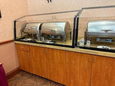 a restaurant counter with a glass counter top at 110 - Next to Disney - Pool in Orlando
