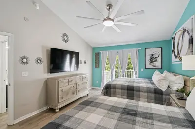 a bedroom with a bed and a ceiling fan at 2022 Royal Bay #94 in Kissimmee