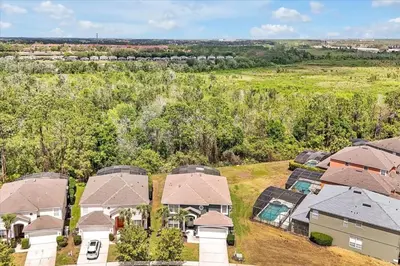 an aerial view of a group of houses at Emerald Island Resort 6 Bed Pool & Spa villa in Kissimmee