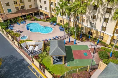 an aerial view of a swimming pool at a resort at Harry Potter Stay Near Universal in Orlando