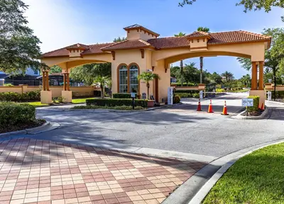 a gazebo in front of a building at 6BR Fun Villa – Game Room, Pool, Near Parks in Kissimmee