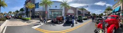 a street with cars parked in a parking lot at Waves of Relaxation - For 8 in Orlando