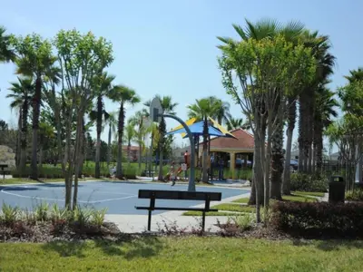 a park with a ping pong table and palm trees at Sunshine Oasis Villa by Paradise Resort Vacations in Kissimmee