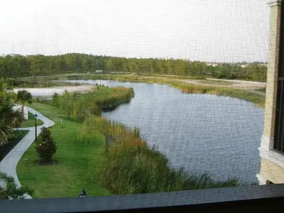 a view of a body of water from a window at Luxury 3-bed Condo Near Disney Worldquest Resort in Orlando