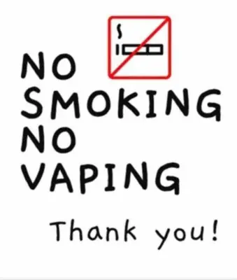 a sign that says no smoking no parking thank you at Condo Disney Universal Epic Free Parking in Orlando