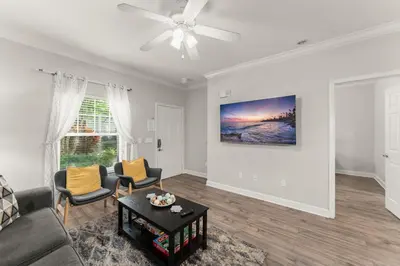 a living room with a couch and a table at Family 3BR near Disney -4102 in Kissimmee