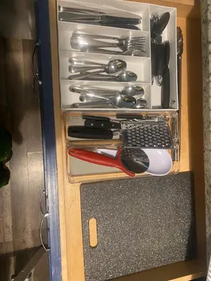 a drawer full of utensils in a cabinet at Orlando 4 bedroom Family Retreat in Orlando