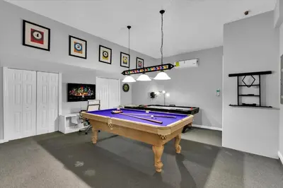a large room with a pool table in it at Urban 6 Bed 4 Bath Villa- Perfect stay while exploring Orlando,Florida in Orlando