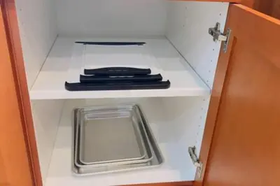 a white drawer with a plate and a knife at Perfect Summer Escape - Townhome by Disney in Orlando